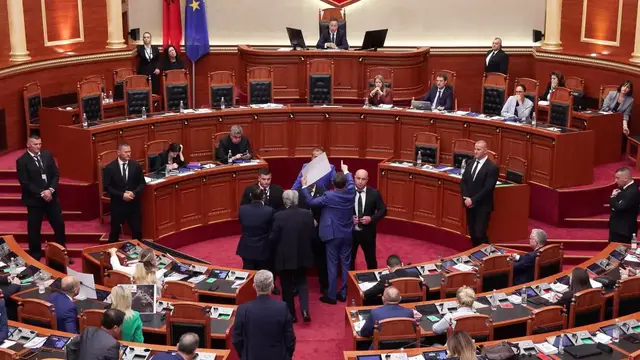 Video thumbnail for Albania: Albanian parliament session disrupted as opposition lawmakers block podium.