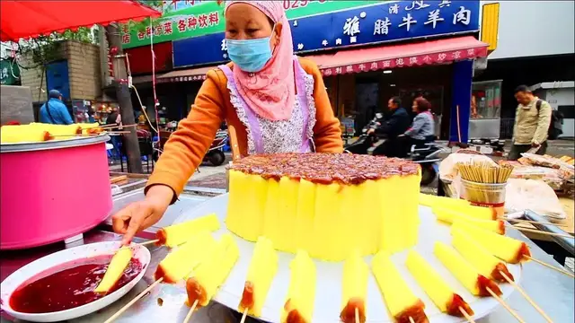 'Video thumbnail for Chinese Street Food in Xi'an - MUSLIM Street Food in China + INCREDIBLE Chinese Food Market (HALAL)'