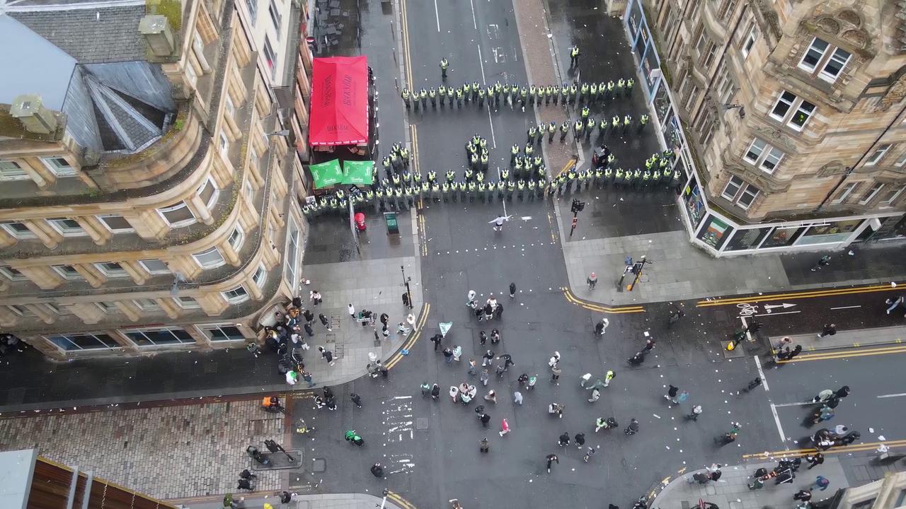 Video thumbnail for Scotland: Celtic Fans Clash With Police During Title Celebrations, Glasgow 6.