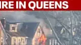 Video thumbnail for Three-alarm fire rips through Queens home on Christmas