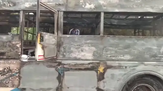 Video thumbnail for India: Moving bus bursts into flames on highway as passengers escape burning vehicle safely.