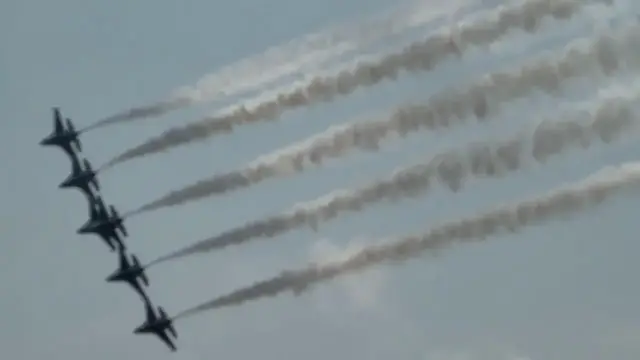 Video thumbnail for US: US Air Force Thunderbirds Fly in Formation at Rochester Airshow.