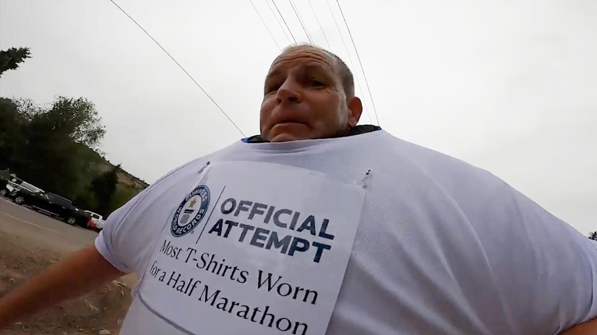 Video thumbnail for Most T-shirts worn during a half marathon (male)  137 by David Rush