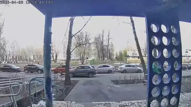 Video thumbnail for Scooter Boy Nearly Hit by Car in Russian Park