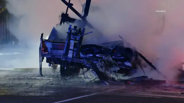 Video thumbnail for US, Los Angeles: Long Beach RV Ablaze In Middle Of Road.