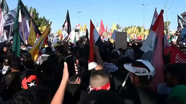 Video thumbnail for Iraq: Thousands gather in Iraq for funeral procession of slain Iranian leader Khamenei.