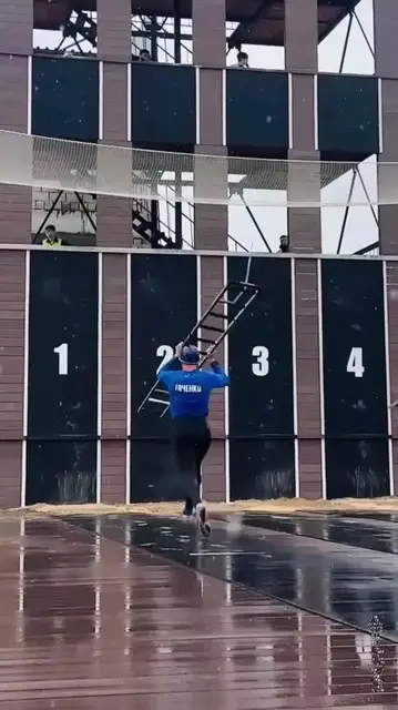 Video thumbnail for Firefighter Sport Athletes Racing Up a Tower with Ladders