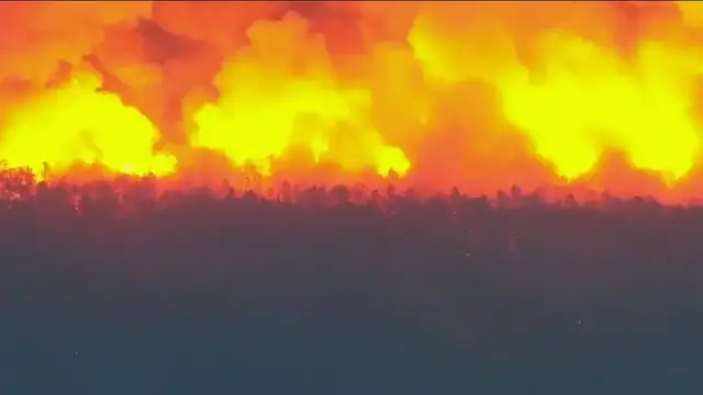Video thumbnail for NJ wildfire now 50 percent contained