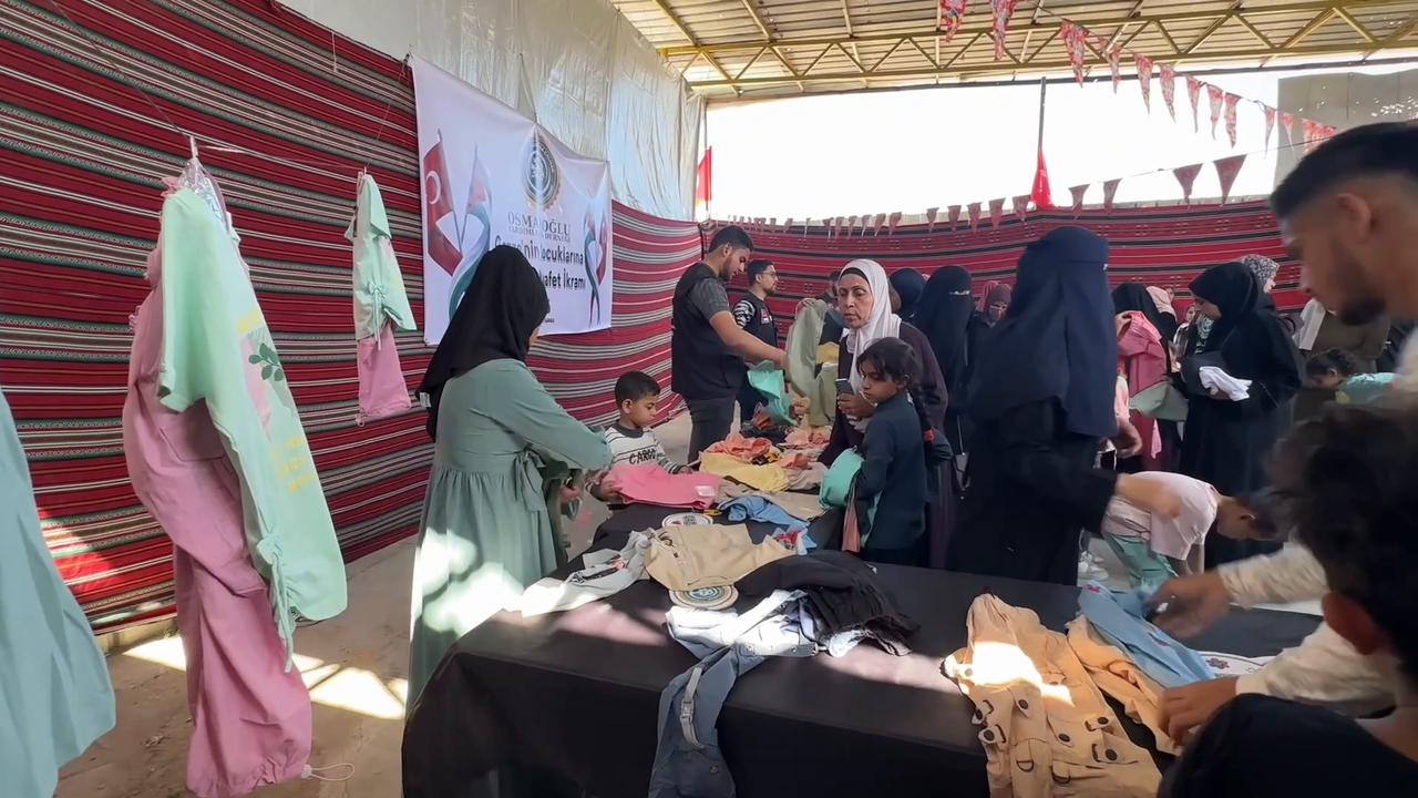 Video thumbnail for Event held in Gaza for distribution of Eid clothes to orphan children.