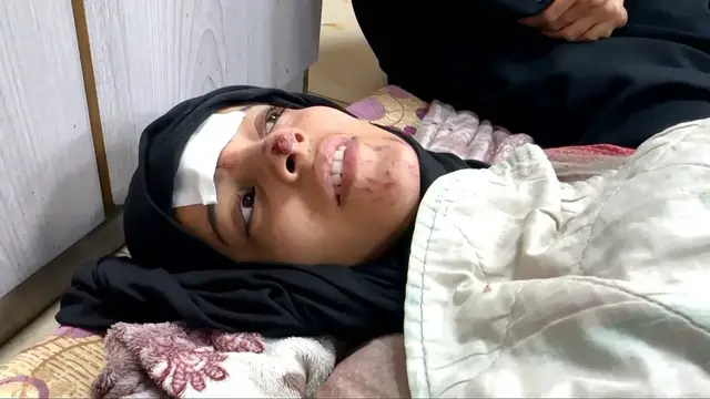 'Video thumbnail for Rescued Palestinian woman recounts horror of being buried under rubble after Israeli Gaza bombing'