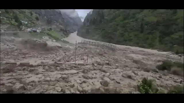 Video thumbnail for India: Chamoli Cloudburst Triggers Flash Floods, Sweeps Away Bridge in Niti Valley.