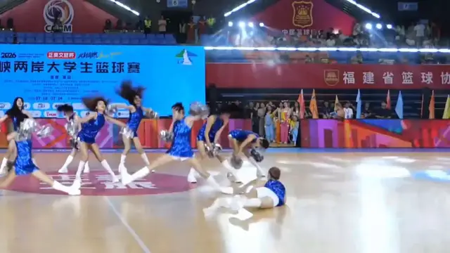 Video thumbnail for China: Chinese cheerleader turns failed flip into split during basketball game.