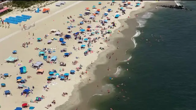 Video thumbnail for US: Crowds flock to Cape May Beach in New Jersey ahead of Labor Day.