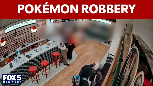 Video thumbnail for Surveillance video shows armed robbery at Pokémon card shop