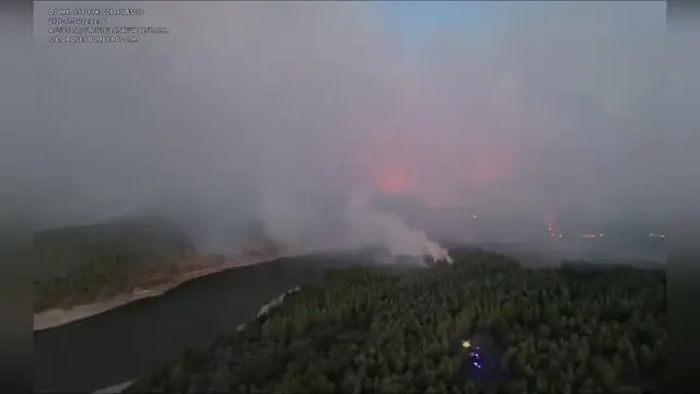 Video thumbnail for Spain: Drone Footage Captures Massive Lozoyuela Wildfire Spreading Across Spain.