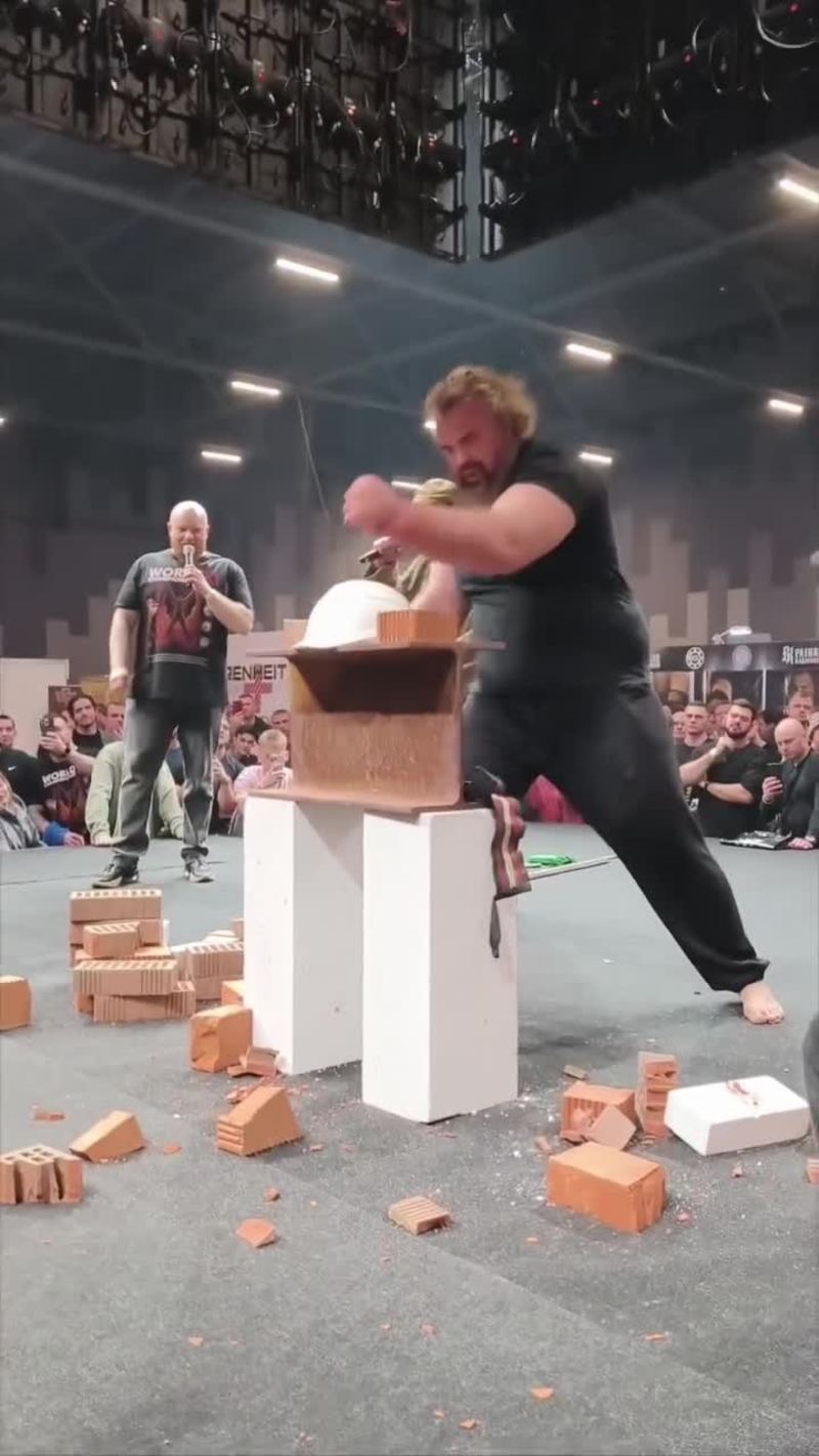 Video thumbnail for Strongman Shatters Construction Helmet with Bare Hand