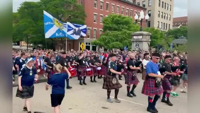 Video thumbnail for US: Scottish Fans Flood Providence Streets In Vibrant Tartan Army Parade.