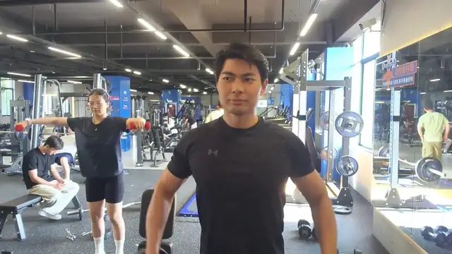 Video thumbnail for China: Chinese man catches woman secretly following his workout but doing every move wrong.
