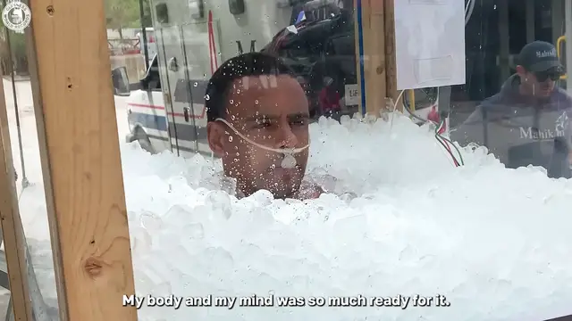 Video thumbnail for Man spends over four hours submerged in ice