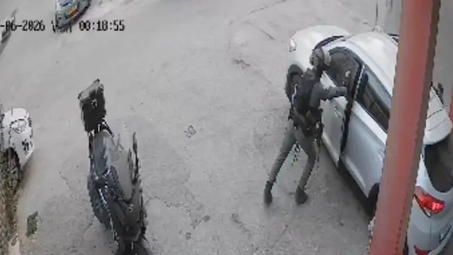 Video thumbnail for Moment Israeli soldier hurls stun grenade into Palestinians’ car
