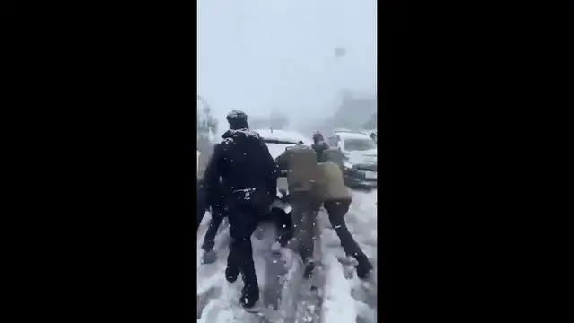 Video thumbnail for India: Motorists Push Stranded Car Through Snow as Heavy Snowfall Hits Himachal Pradesh.