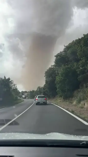 Video thumbnail for Giant Dust Tornado Looms over Rural Road