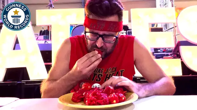 'Video thumbnail for Fastest time to eat 25 Carolina Reaper Chilli peppers'
