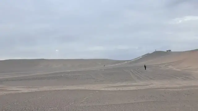Video thumbnail for Motocross Rider Falls After Losing Balance on Desert Ramps in Xinjiang