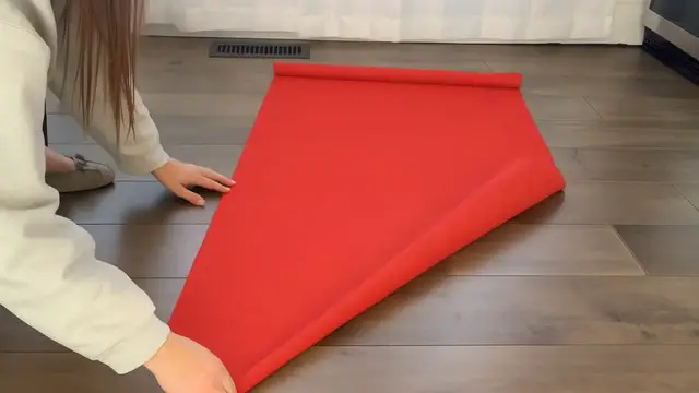 Video thumbnail for She lays wrapping paper on her kitchen floor for this GENIUS idea!
