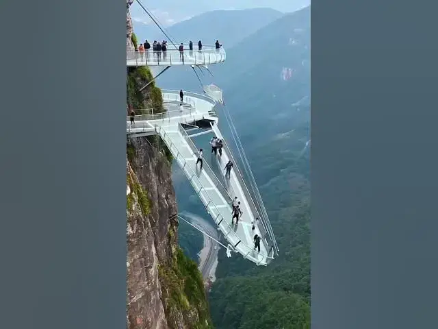 Video thumbnail for The World's Craziest Cliff Slide! #GlassAdventure