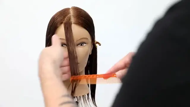 Video thumbnail for How to cut perfect face framing layers for long hair