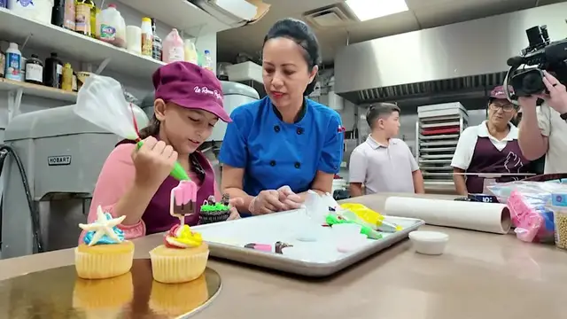 Video thumbnail for Suffolk police officers surprise 11-year-old brain cancer survivor with her dream of being a baker