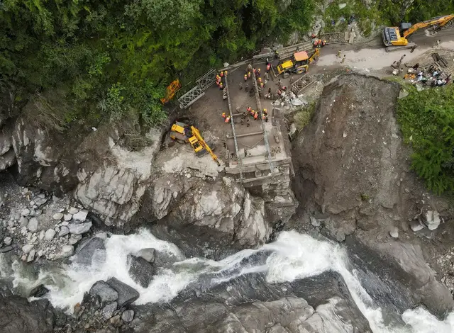 'Video thumbnail for Makeshift bridge reconnects Indian communities cut off by landslides'