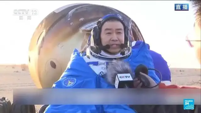 'Video thumbnail for Chinese astronauts return to earth after spacecraft damaged by space debris'