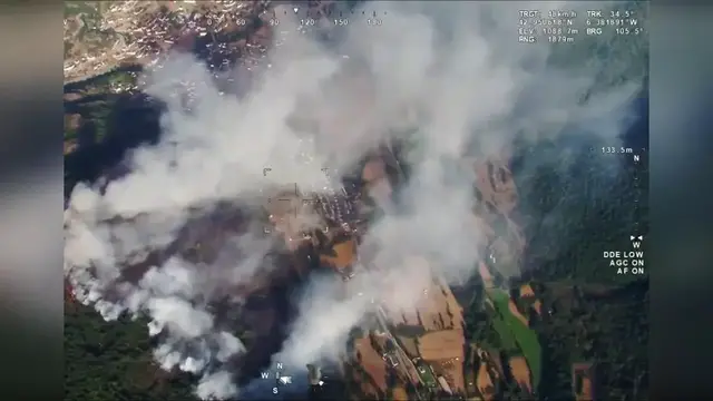 Video thumbnail for Spain: Wildfire Rages Toward Pine Forest Near León Town.