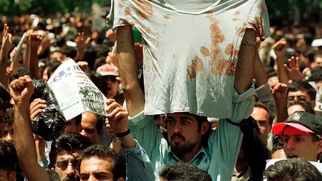 Video thumbnail for Iran police officer killed as protests over cost of living enter 12th day