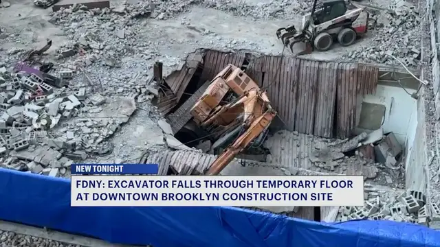 Video thumbnail for Excavator falls through floor at Downtown Brooklyn construction site