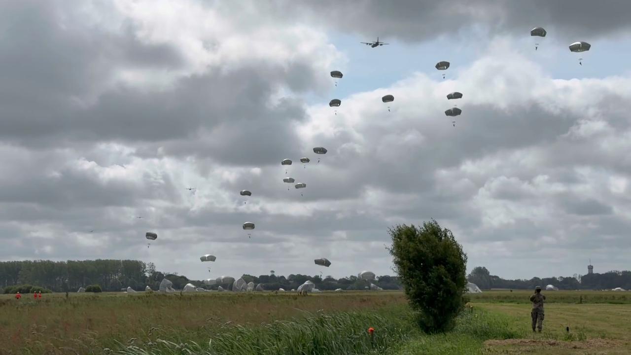 Video thumbnail for France: Military Forces Recreate Airborne Jump In Normandy D-Day Tribute.