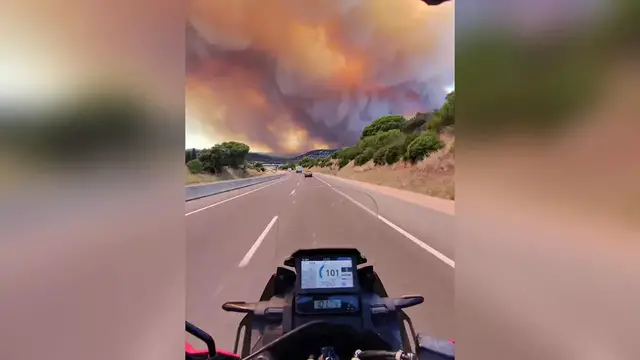 Video thumbnail for Spain: POV captures wildfire engulfing mountains in Spain's Catalonia.