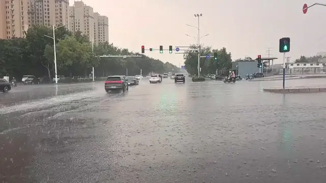 Video thumbnail for China: China issues rainstorm alerts as downpours raise flood risks.