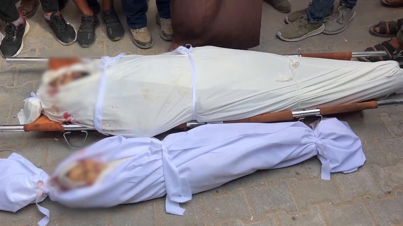 Video thumbnail for Palestinians hold funeral prayer for four killed in Israeli attack on tent in Gaza.