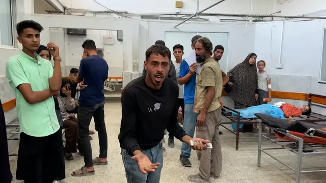 'Video thumbnail for Palestinian man searches for child as Al Jazeera reports from Gaza hospital'