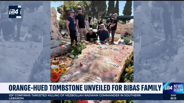 'Video thumbnail for Orange-hued tombstone unveiled for Bibas family'
