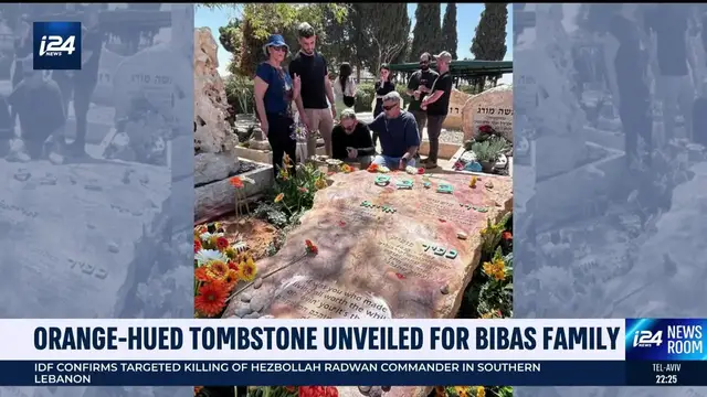 'Video thumbnail for Orange-hued tombstone unveiled for Bibas family'