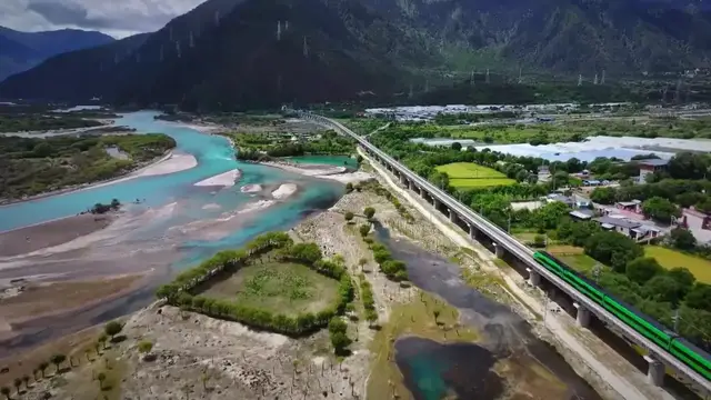 Video thumbnail for China: Qinghai-Xizang Railway transports 100 million passenger trips in two decades.