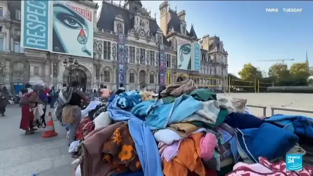 'Video thumbnail for Migrants encamped on Paris city hall forecourt evacuated'