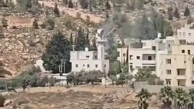 'Video thumbnail for Israeli forces destroy minaret of mosque in town near Hebron'