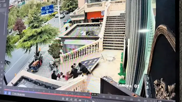 Video thumbnail for Huge Sign Falls on Woman at Tibet Courtyard Entrance