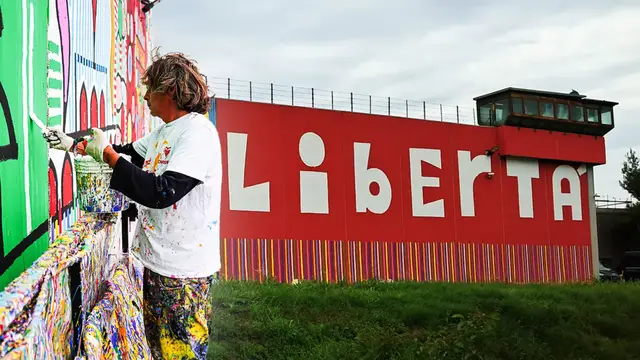 Video thumbnail for Artist creates brilliant mural on side of a prison