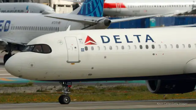 'Video thumbnail for Hundreds forced to stay the night on planes after Delta flights diverted'